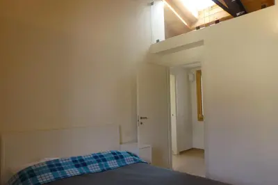 Letto o letti in una camera di Casa Kaletheia