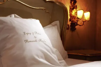 Letto o letti in una camera di Hotel Flora - By Romanelli Family