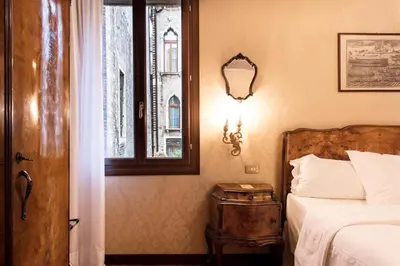 Letto o letti in una camera di Hotel Flora - By Romanelli Family