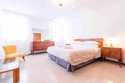 Letto o letti in una camera di CA CAMMELLO private terrace and canal view