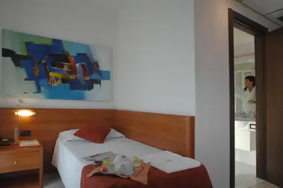 Letto o letti in una camera di Hotel Scaldaferro