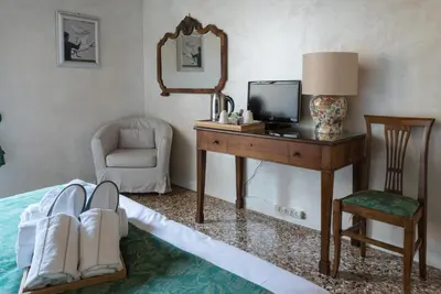 TV o dispositivi per l'intrattenimento presso Locanda Ai Santi Apostoli Sul Canal Grande - Ferretti Hotels Collection
