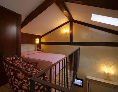 Letto o letti in una camera di Hotel Bisanzio