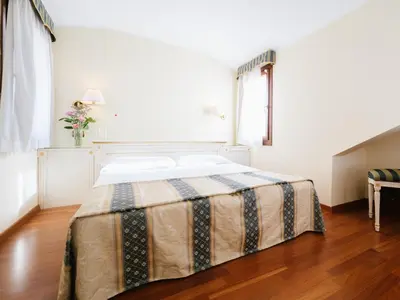 Letto o letti in una camera di Hotel Do Pozzi