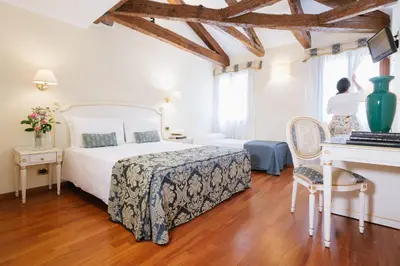 Letto o letti in una camera di Hotel Do Pozzi