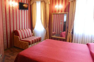 Letto o letti in una camera di Hotel Città Di Milano