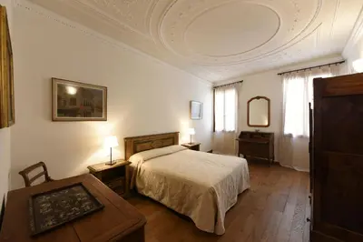 Letto o letti in una camera di Le Due Corone Bed & Breakfast