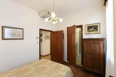Letto o letti in una camera di Le Due Corone Bed & Breakfast