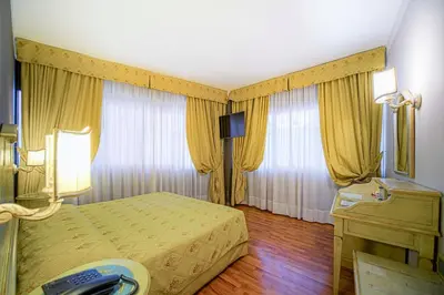 Letto o letti in una camera di Hotel Aaron