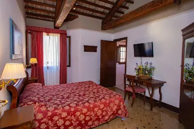 Letto o letti in una camera di Locanda Casa Martini