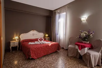Letto o letti in una camera di Locanda Casa Martini