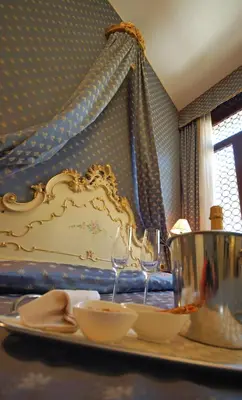 Letto o letti in una camera di Hotel Torino
