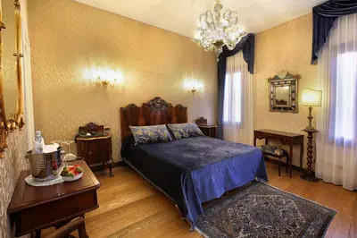 Letto o letti in una camera di Ca' Pagan