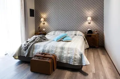 Letto o letti in una camera di Alla Meta