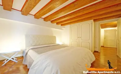 Letto o letti in una camera di WellVenice Rialto