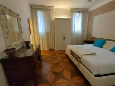Letto o letti in una camera di La Grande Bellezza (Deluxe House)