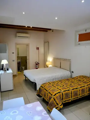 Letto o letti in una camera di Palazzo Penzo Bellemo