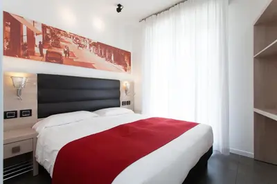 Letto o letti in una camera di Hotel Adlon