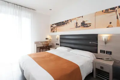 Letto o letti in una camera di Hotel Adlon