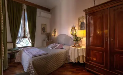 Letto o letti in una camera di Ca' della Corte