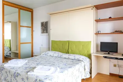 Letto o letti in una camera di La mini Dimora di Lara
