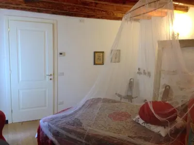 Letto o letti in una camera di Ca' del Gaffaro