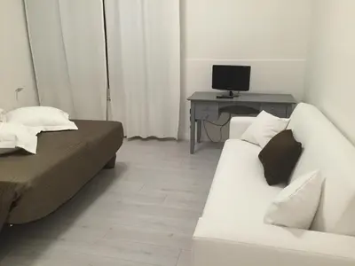 TV o dispositivi per l'intrattenimento presso Sunday Apartments
