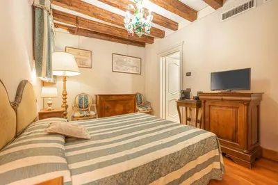 Letto o letti in una camera di Cà Valeri