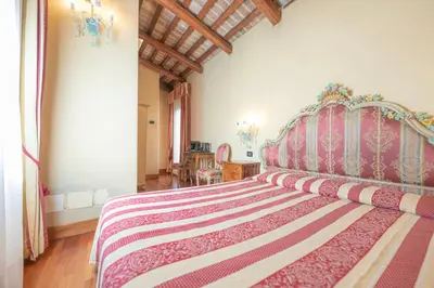 Letto o letti in una camera di Cà Valeri
