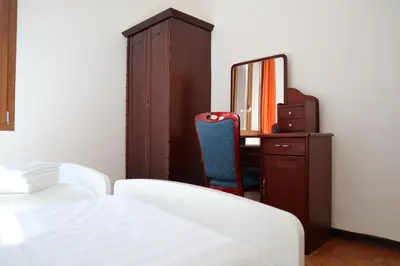 Letto o letti in una camera di b&b Wu Giada