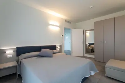 Letto o letti in una camera di Residence Panama