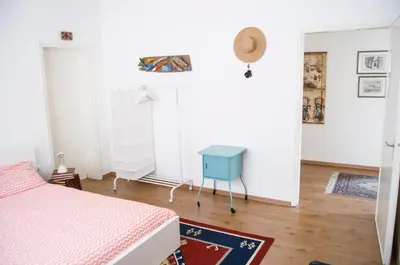 Letto o letti in una camera di Nanda house