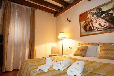 Letto o letti in una camera di Appartamento Rialto Laura