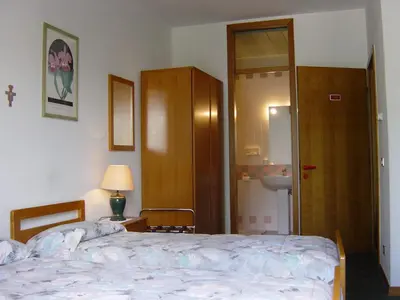 Letto o letti in una camera di Hotel Rizzi