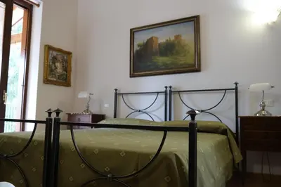 Letto o letti in una camera di B&B in Valle
