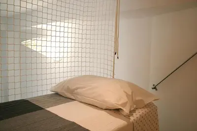 Letto o letti in una camera di B&B Loft Padova