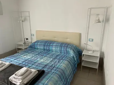 Letto o letti in una camera di Ca' Delle Erbe