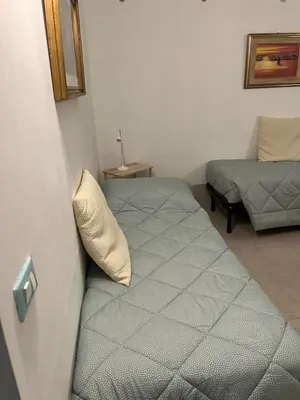 Letto o letti in una camera di Ca' Delle Erbe