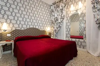 Letto o letti in una camera di Hotel Ca' Nobile Corner