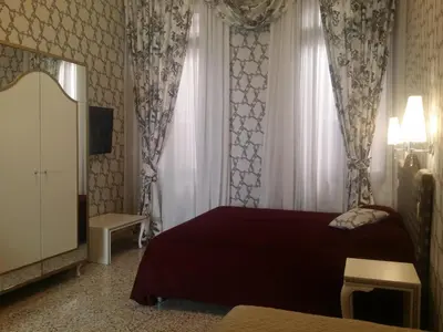 Letto o letti in una camera di Hotel Ca' Nobile Corner