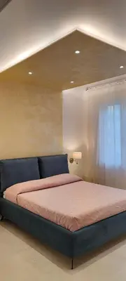 Letto o letti in una camera di Casa Mariettina