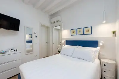Letto o letti in una camera di San Marco Design Suites