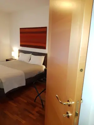 Letto o letti in una camera di Guest House Marco Polo