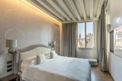 Letto o letti in una camera di Palazzo Morosini Degli Spezieri - Lifestyle Apartments