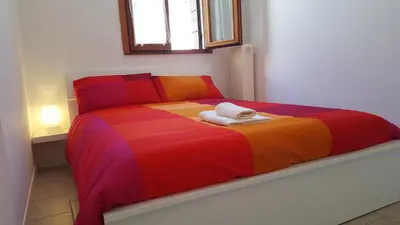 Letto o letti in una camera di Casa Euganea