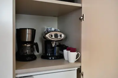 Set per la preparazione di tè e caffè presso Palazzo Bovio - Boutique Apartments