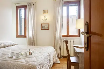 Letto o letti in una camera di Redentore - LOCAPPART