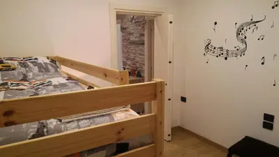Letto o letti in una camera di Appartamento Ca' Lela