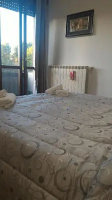 Letto o letti in una camera di Appartamento Ca' Lela