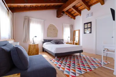 Letto o letti in una camera di B&B Mulino di Campese